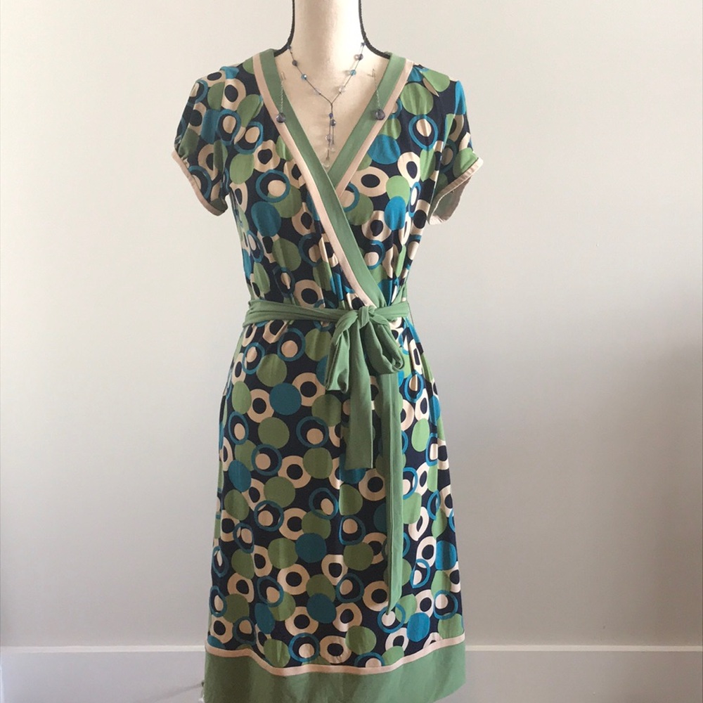 A green blue and cream wrap dress